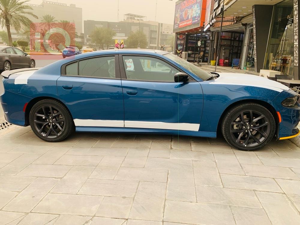 دۆج چارجەر
